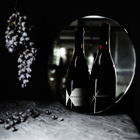 Exprimere Wine Bottles Reflection with Grapes